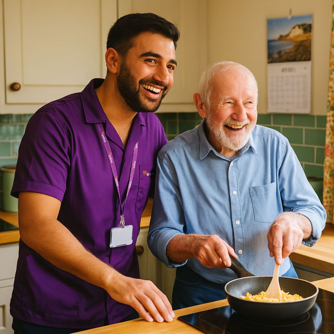 Enliva Home Care Carer helping a client in the kitchen cook some eggs